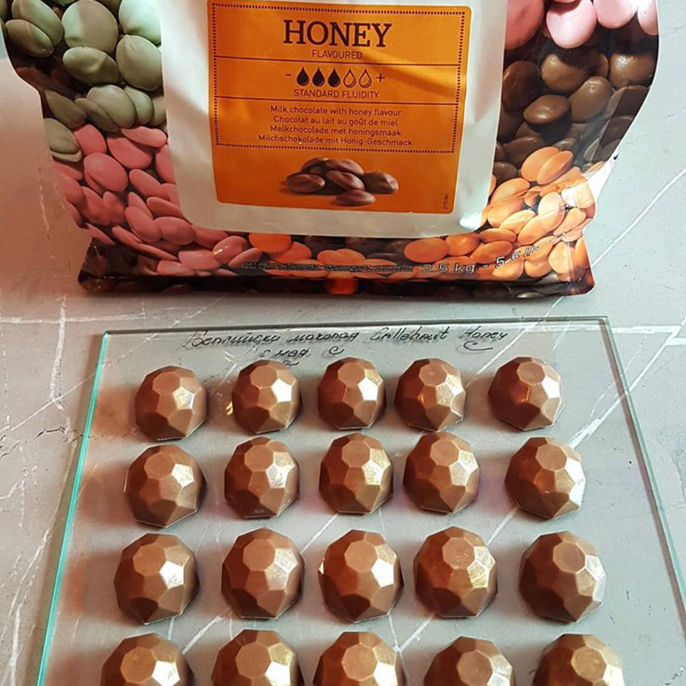 Sampling and exclusive production of chocolates.