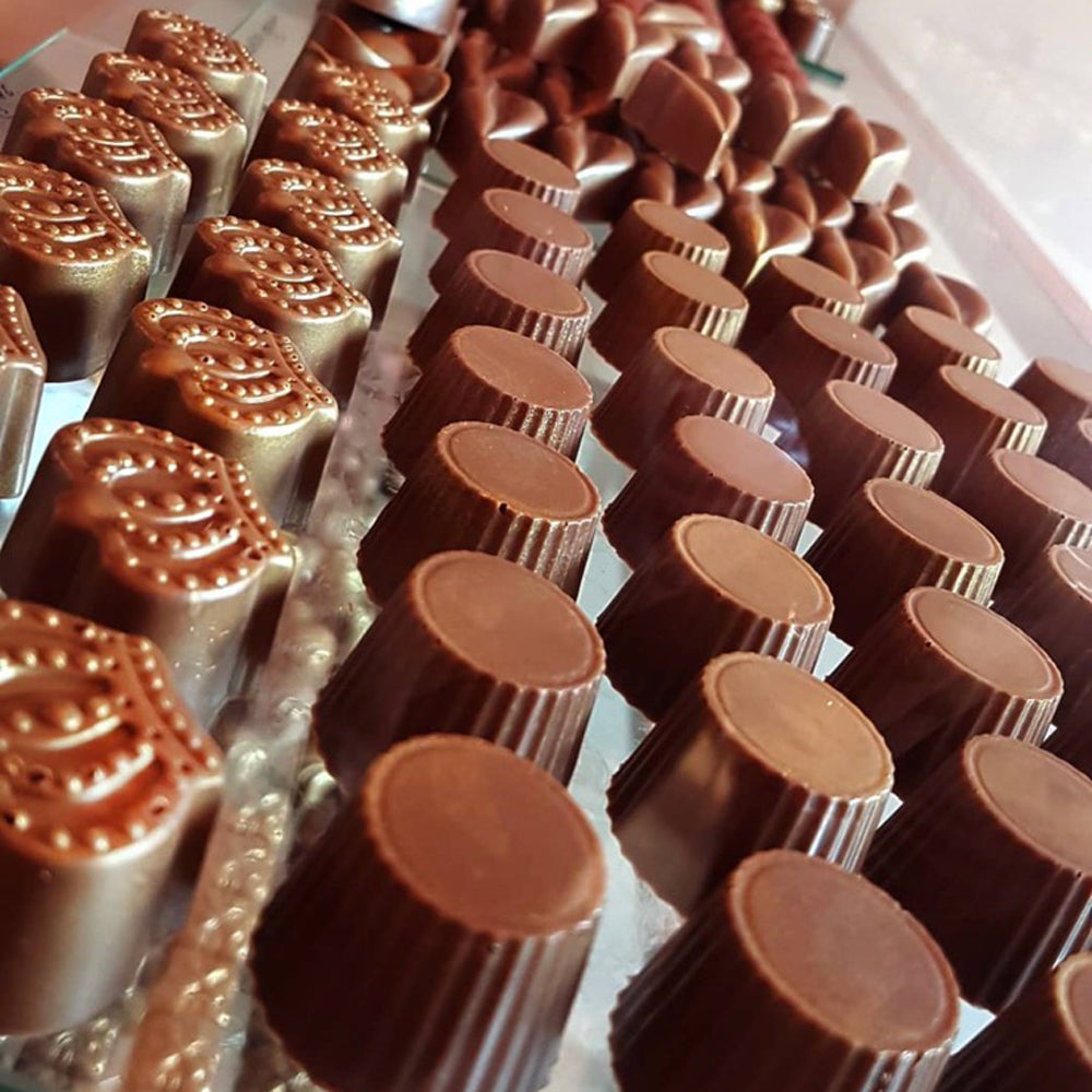 Sampling and exclusive production of chocolates.