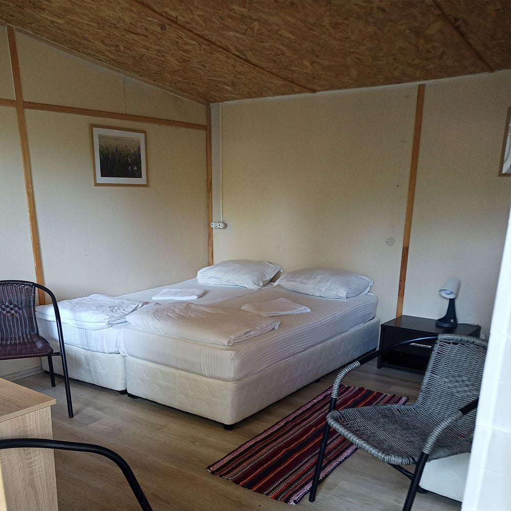 Surfing, kayaking, sailing or paddle board lessons and 2 nights for two by the sea. Camping Nestinarka