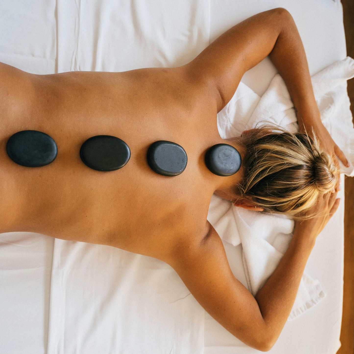Hot stone massage with volcanic stones