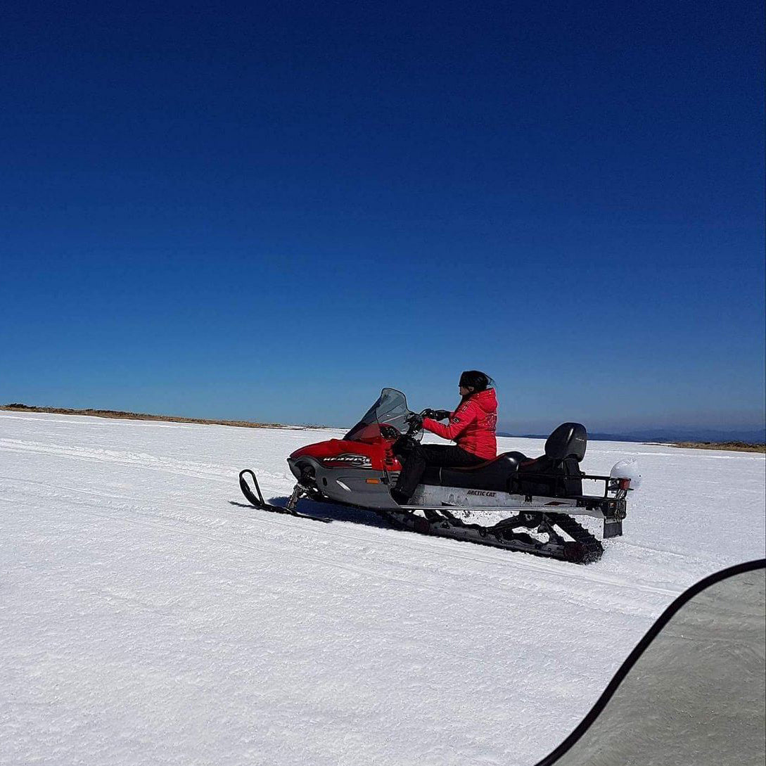 Adventure tour with snowmobiles