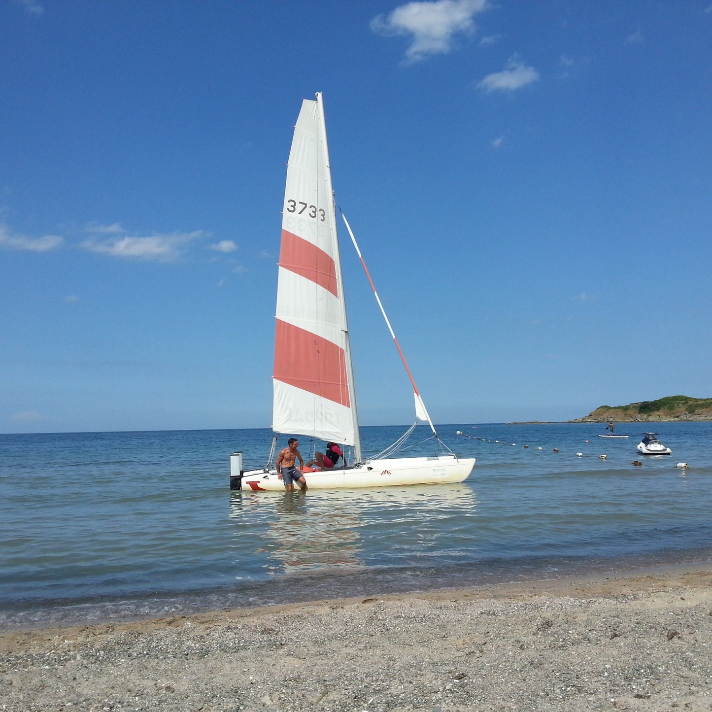 Romance for two on board of a sailing catamaran