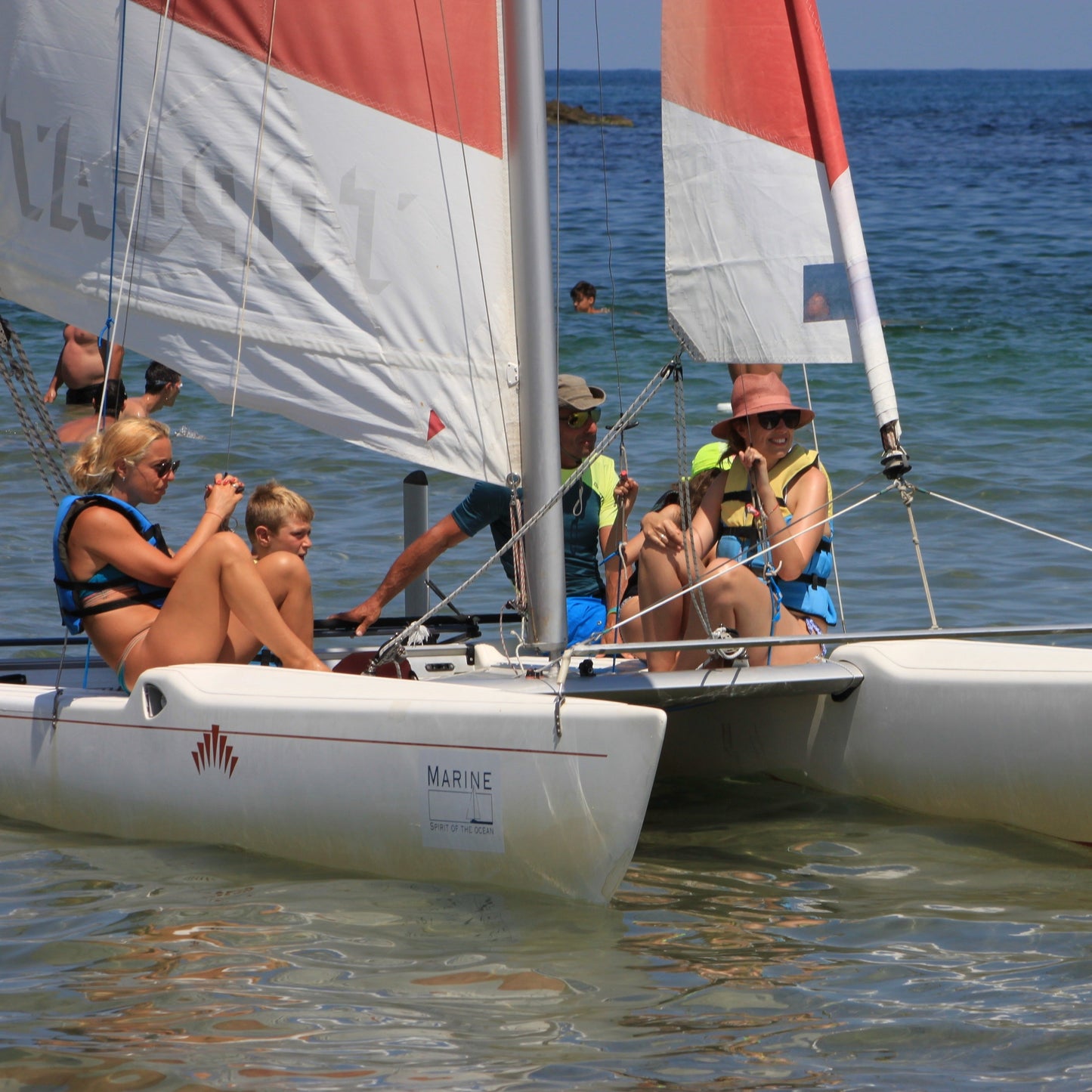 Romance for two on board of a sailing catamaran