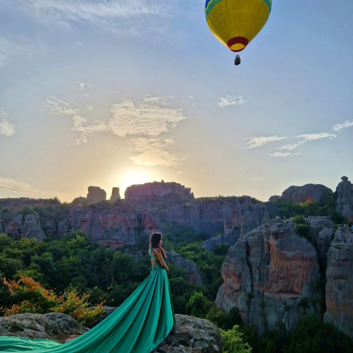 Flying dress photo shoot at the Belogradchik rocks