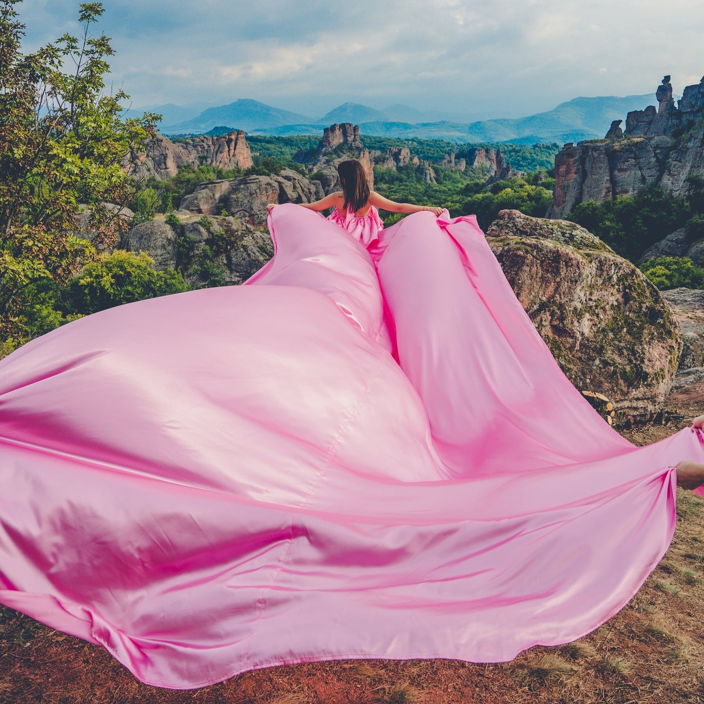 Flying dress photo shoot at the Belogradchik rocks