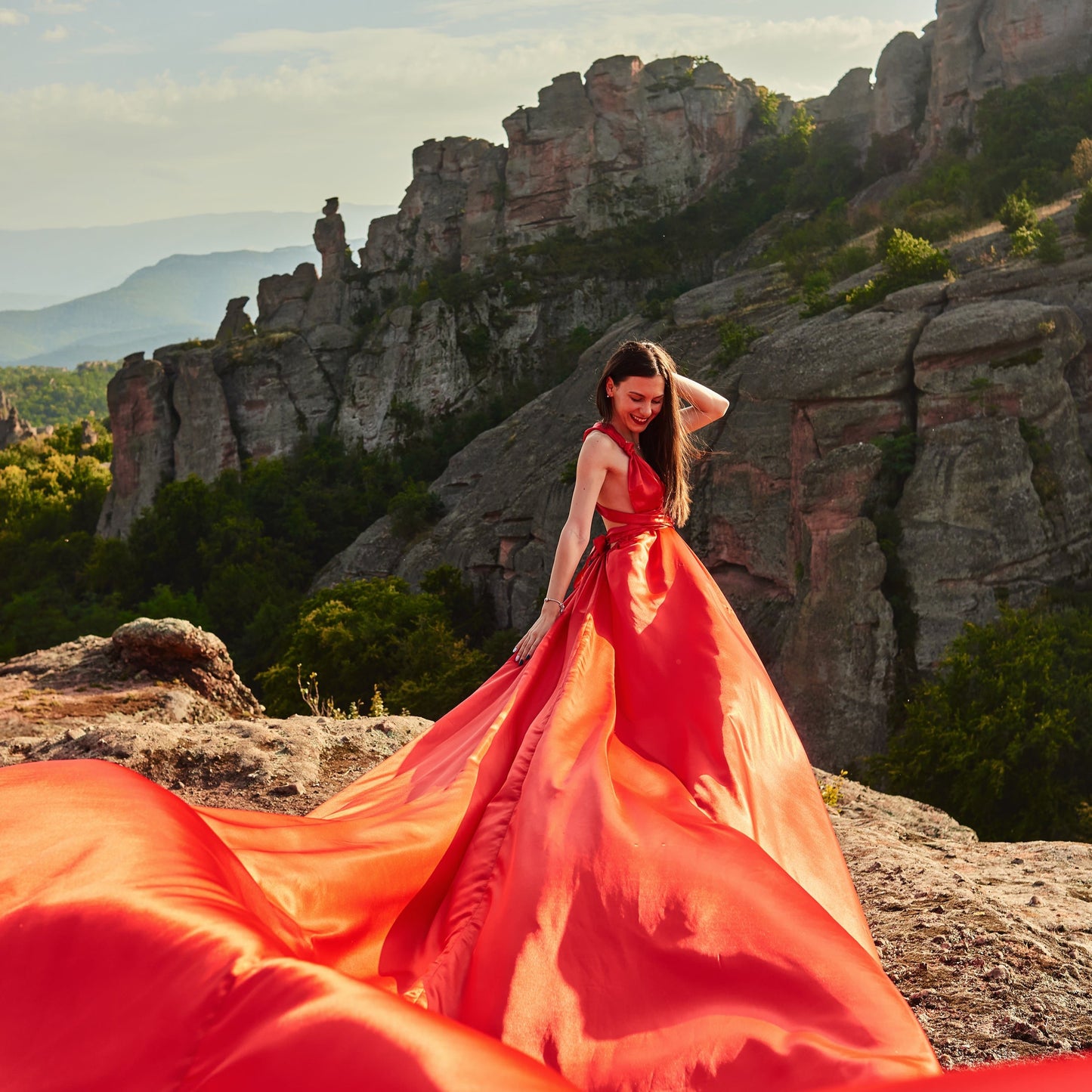 Flying dress photo shoot at the Belogradchik rocks