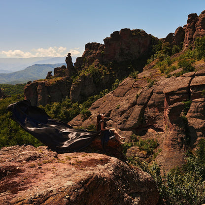 Flying dress photo shoot at the Belogradchik rocks