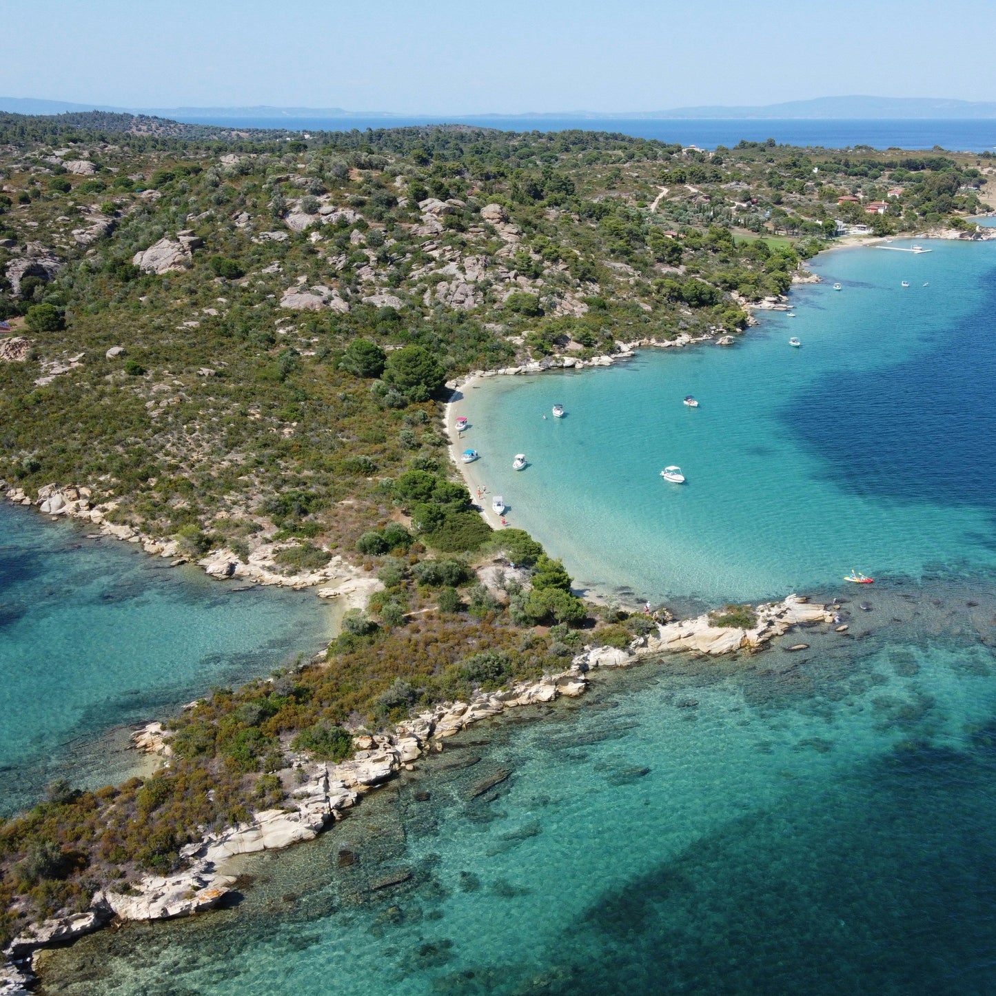 Wine tasting kayak tour for two. Immerse yourself in the beauty of Vourvourou and Diaporos island. Greece