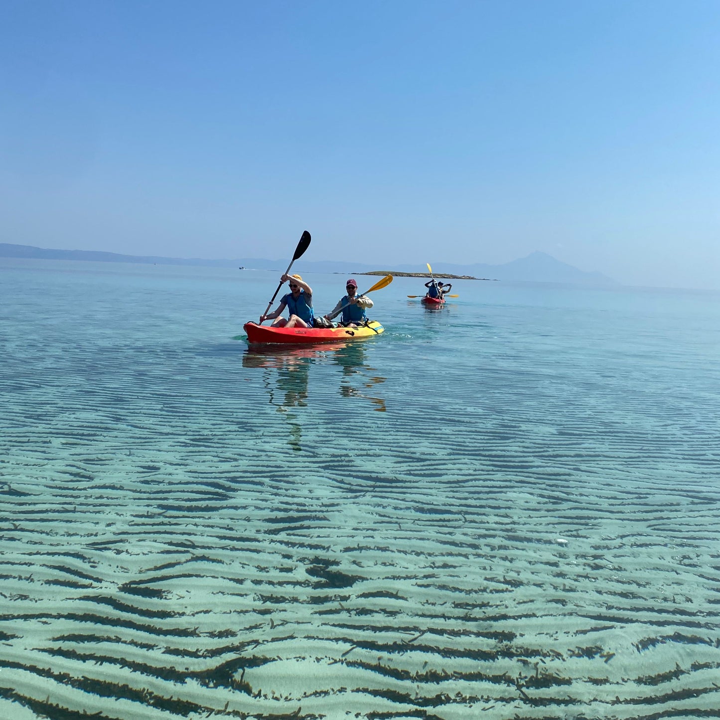 Wine tasting kayak tour for two. Immerse yourself in the beauty of Vourvourou and Diaporos island. Greece