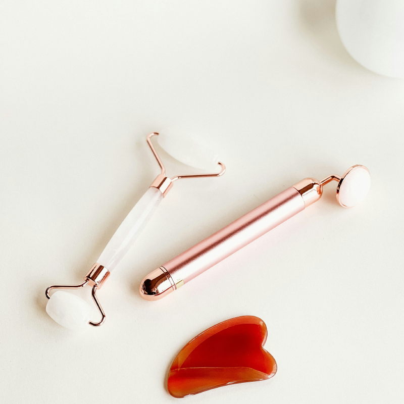 Facial detox therapy with red orange and Gua Sha massage