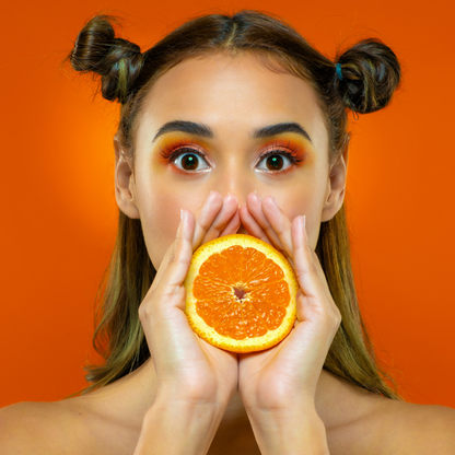 Facial detox therapy with red orange and Gua Sha massage