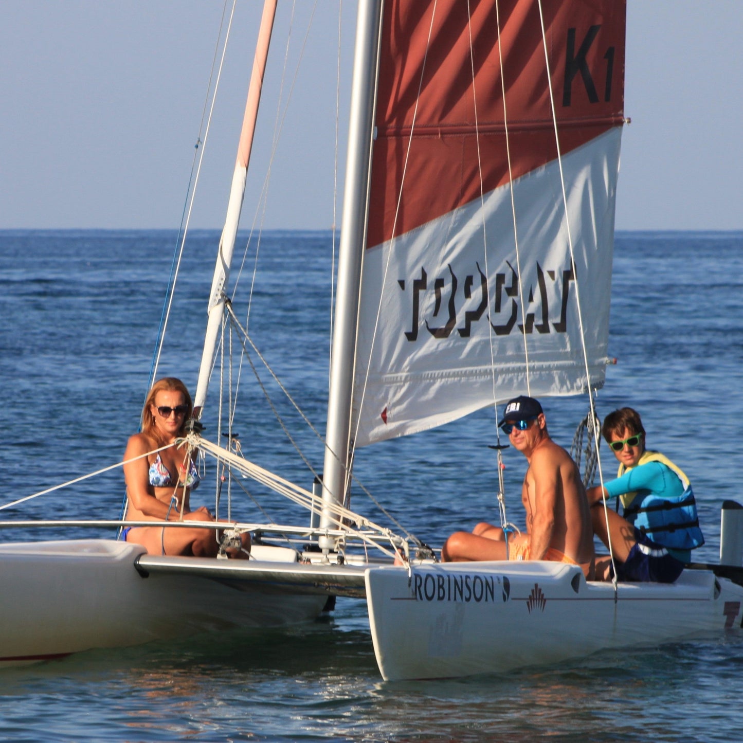 Romance for two on board of a sailing catamaran
